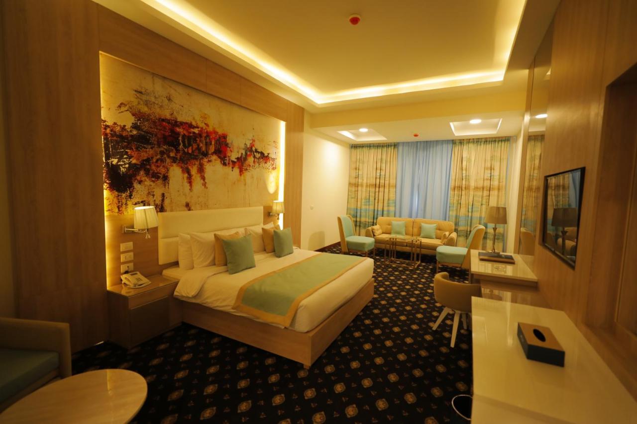 Tolip Gardens Hotel Il Il Cairo Esterno foto A room at the hotel