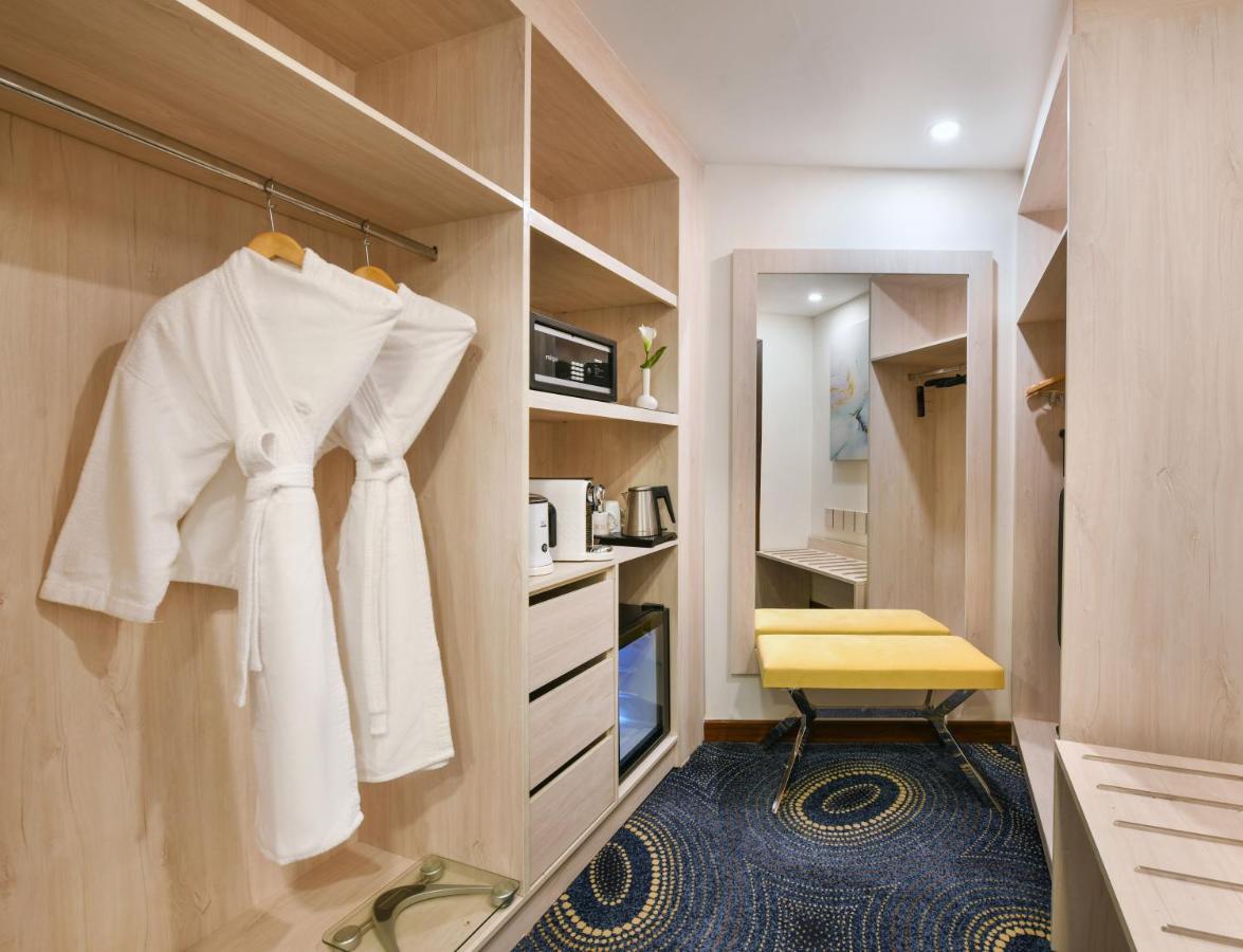 Tolip Gardens Hotel Il Il Cairo Esterno foto A room at the hotel