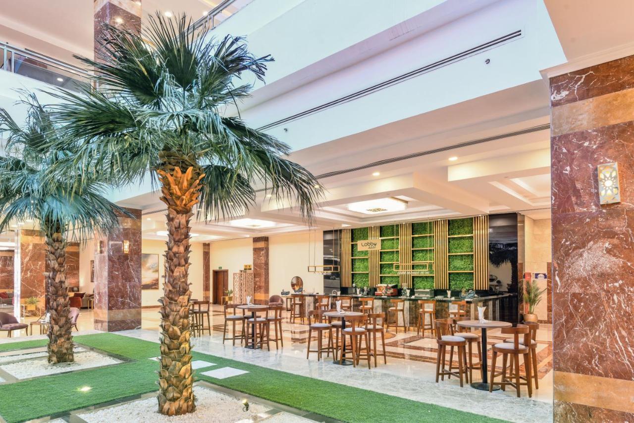 Tolip Gardens Hotel Il Il Cairo Esterno foto Lobby